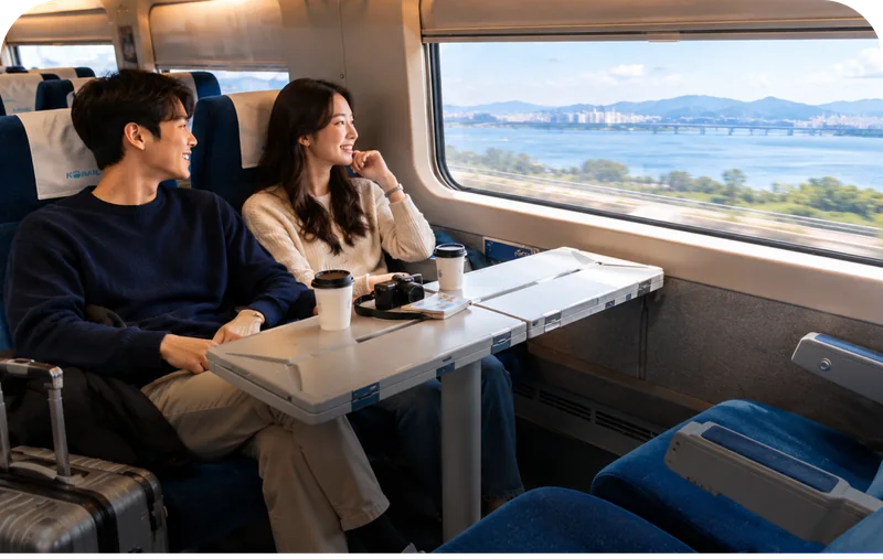 KTX standard class passengers seated by the window
